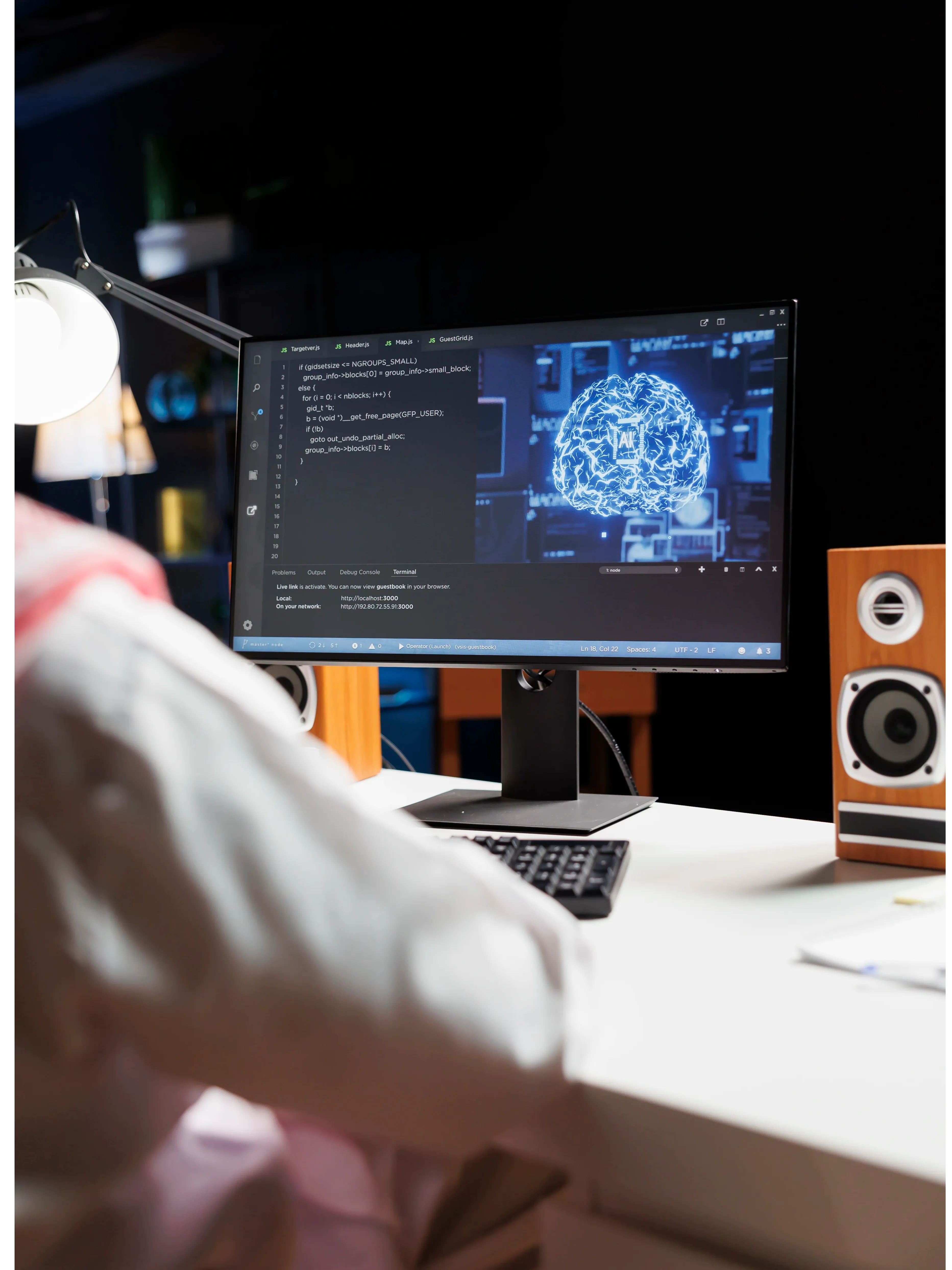 arab-guy-utilizes-ai-desktop-computer.webp